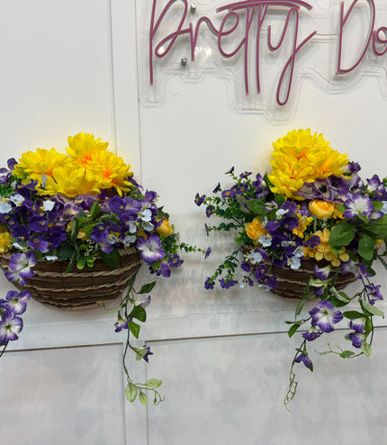 Pair of Wall Mounted Raffia Baskets Filled With Yellow & Purple Flowers ~ Artificial